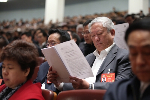 3月12日，十二屆全國人大五次會議在北京人民大會堂舉行第三次全體會議。這是全國政協(xié)委員列席會議。新華社記者 金立旺攝。