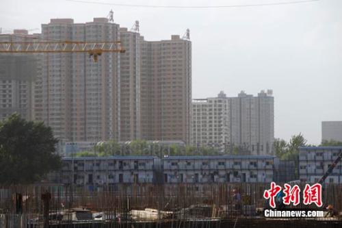 資料圖：正在建設(shè)施工中的工地。 <a target='_blank' href='http://www.chinanews.com/' _fcksavedurl='http://www.chinanews.com/'></table>中新社</a>發(fā) 張?jiān)?攝